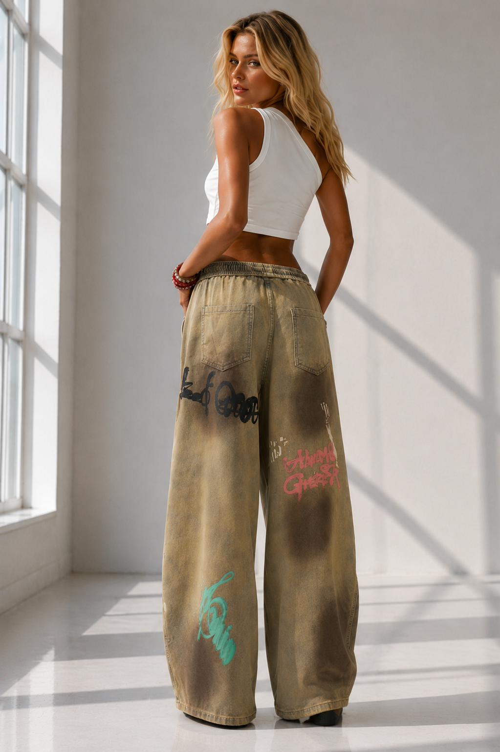Pika Distressed streetwear sweatpants with graffiti