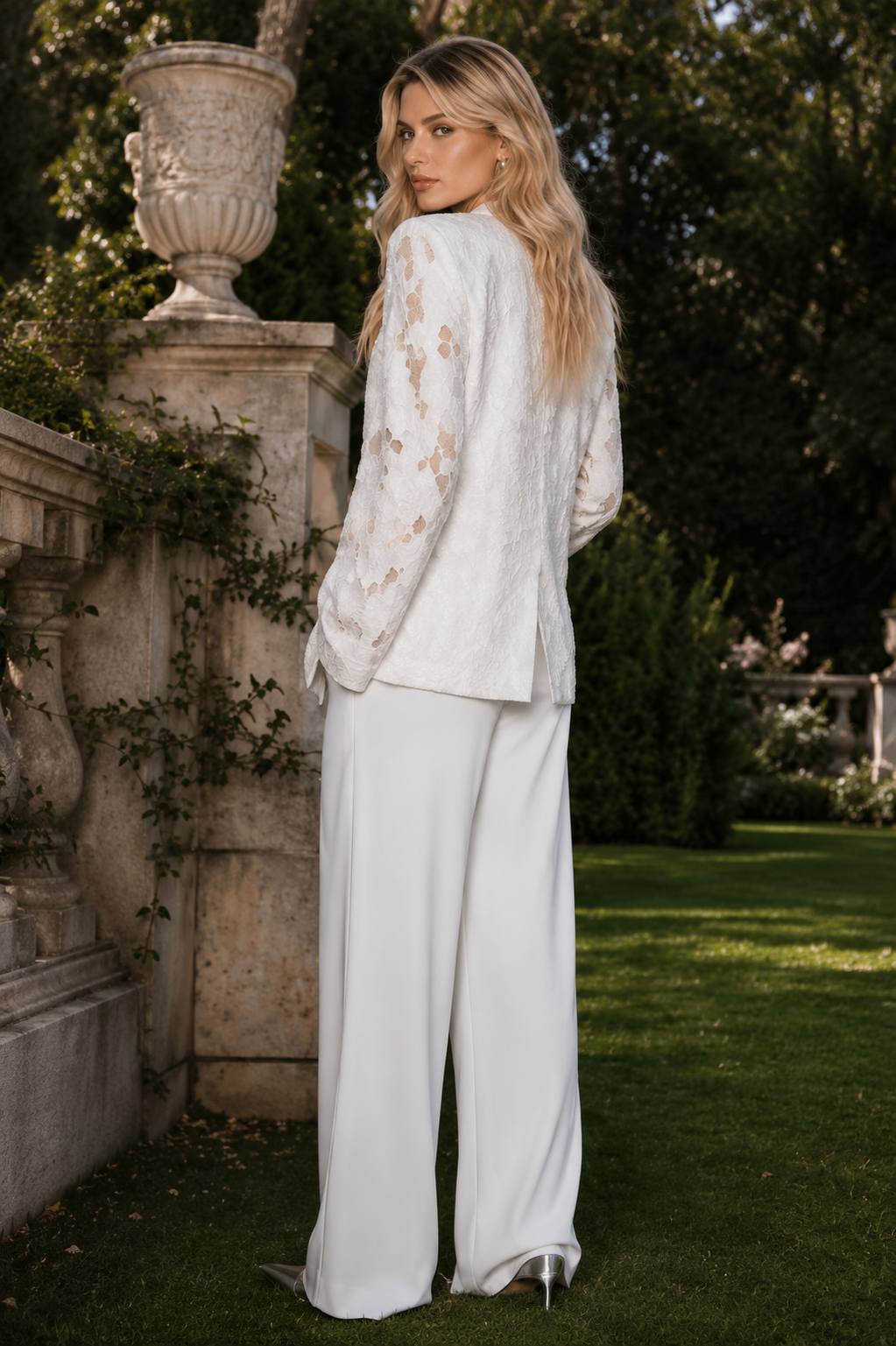 Malika White lace blazer on white backdrop