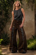 Syrine Brown wide-leg jeans with charm detail